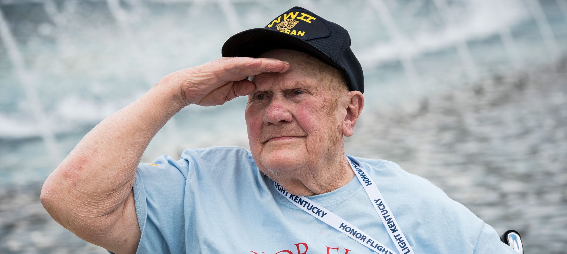 Honor Flight Vet salutes the flag